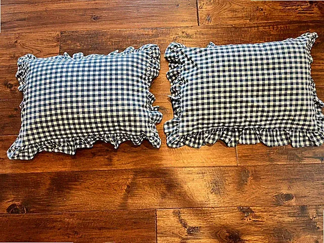 TWO NAVY BLUE AND WHITE GIGHAM CHECK RUFFLED PILLOW SHAMS. KING.